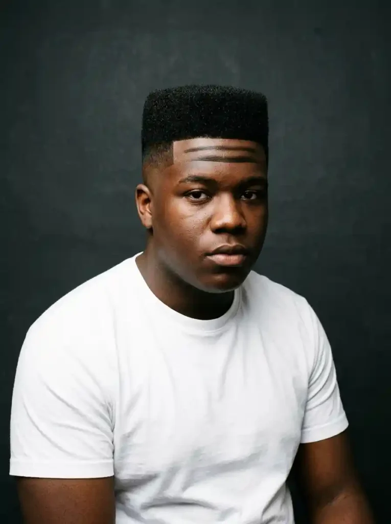 22 Best Hairstyles for Round Faces Men Swear By for Balance 10 Box Fade with Flat Top for Graphic Elongating Cultural Bold