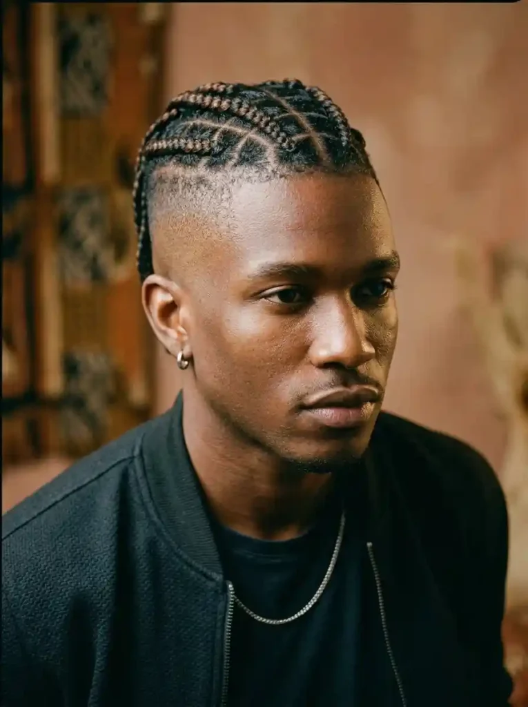24 Black Mens Mohawk Hairstyles That Stand Out Anywhere 7 Braided Mohawk with Box Braids for Bold Long Cultural