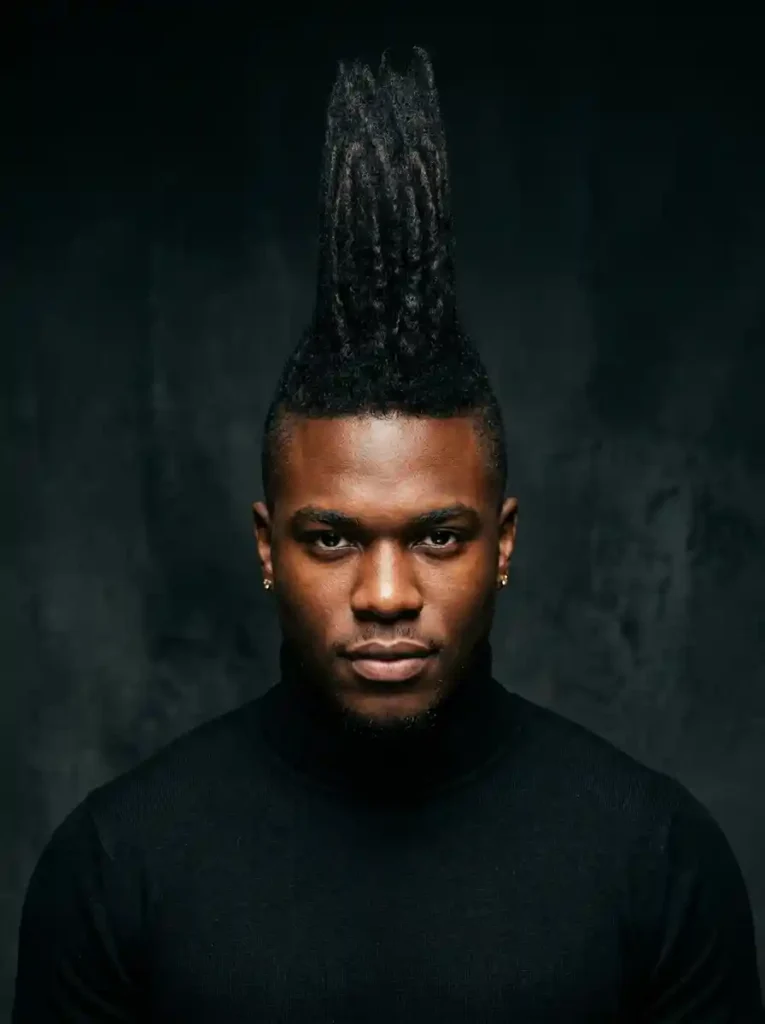 22 Best Hairstyles for Round Faces Men Swear By for Balance 7 Mohawk Fade for Maximum Vertical Bold Round Face Statement