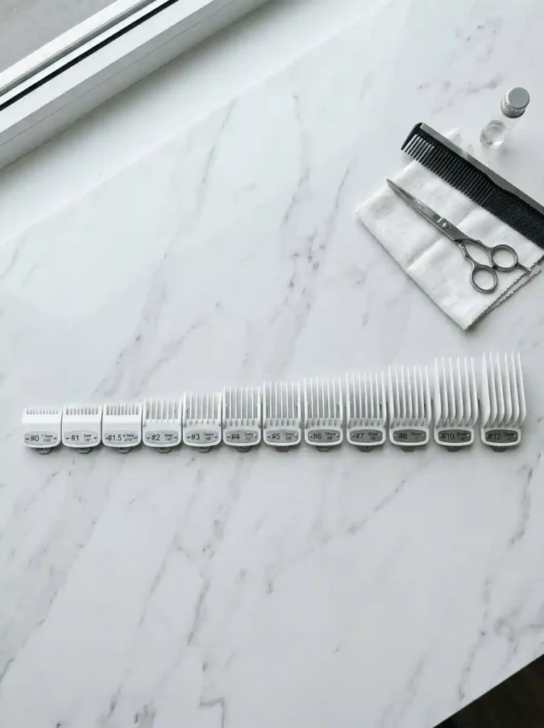 24 How to Do Fade Haircut Like a Pro at Home 6 Working Up Through the Guard Sizes for Seamless Blending